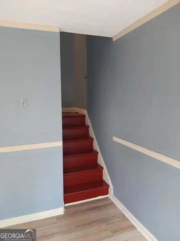 a view of entryway with wooden floor