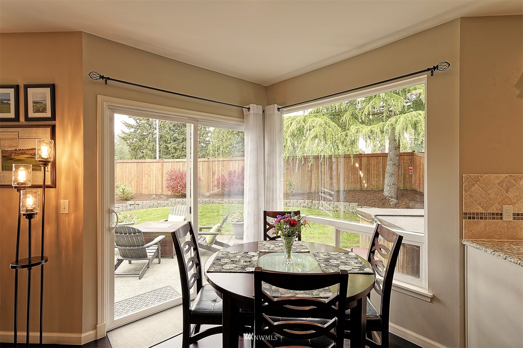 20027 29th Avenue Southeast Bothell, WA 98012 - Photo 12 of 38 a view of a dining room with furniture window and outside view