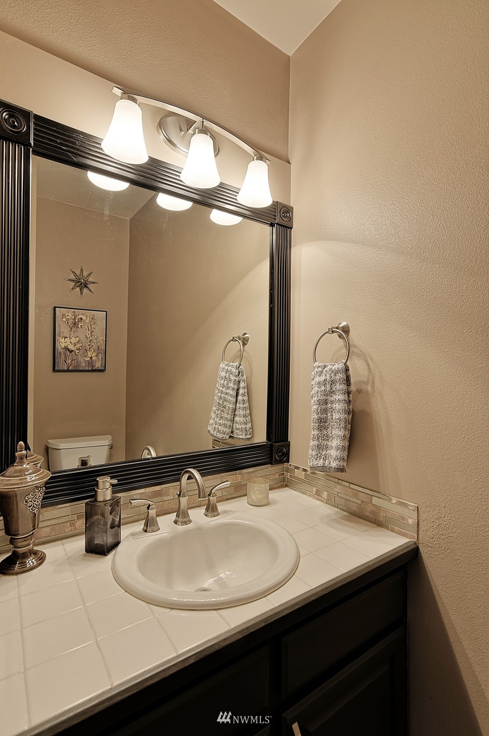 20027 29th Avenue Southeast Bothell, WA 98012 - Photo 20 of 38 a bathroom with a sink and a mirror