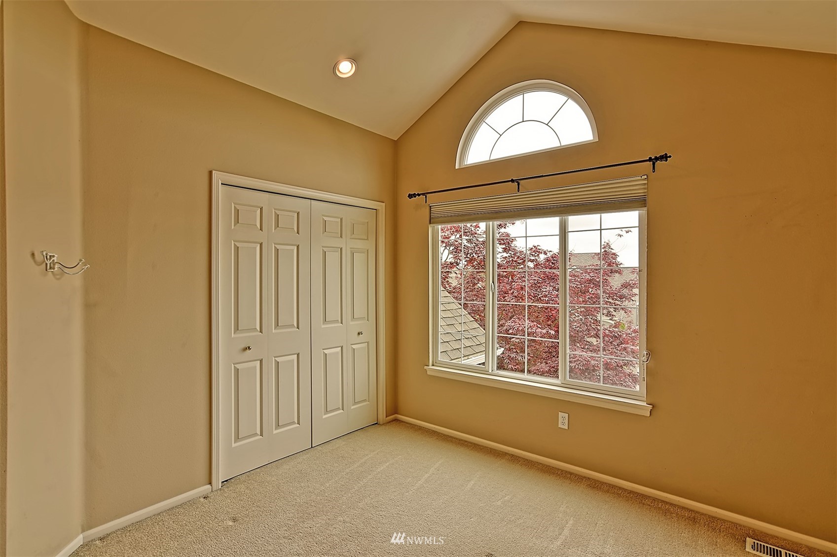 20027 29th Avenue Southeast Bothell, WA 98012 - Photo 22 of 38 an empty room with window mirror and windows