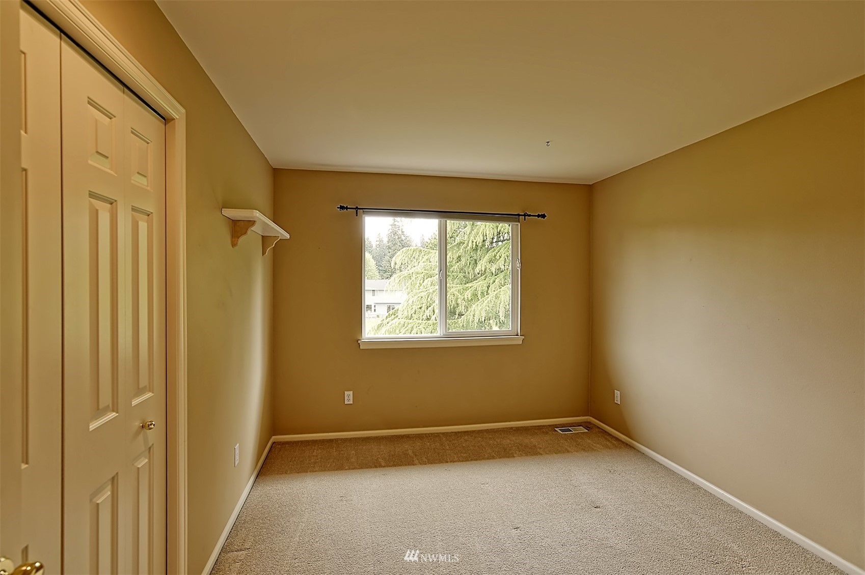 20027 29th Avenue Southeast Bothell, WA 98012 - Photo 27 of 38 a view of an empty room with a window