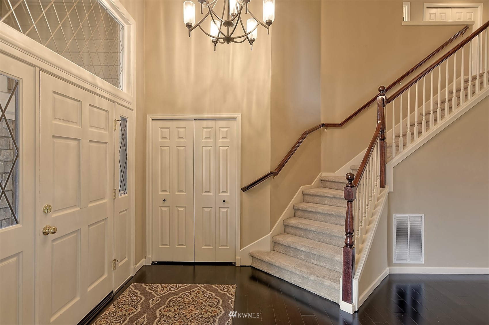 20027 29th Avenue Southeast Bothell, WA 98012 - Photo 6 of 38 a view of entryway with wooden floor and staircase