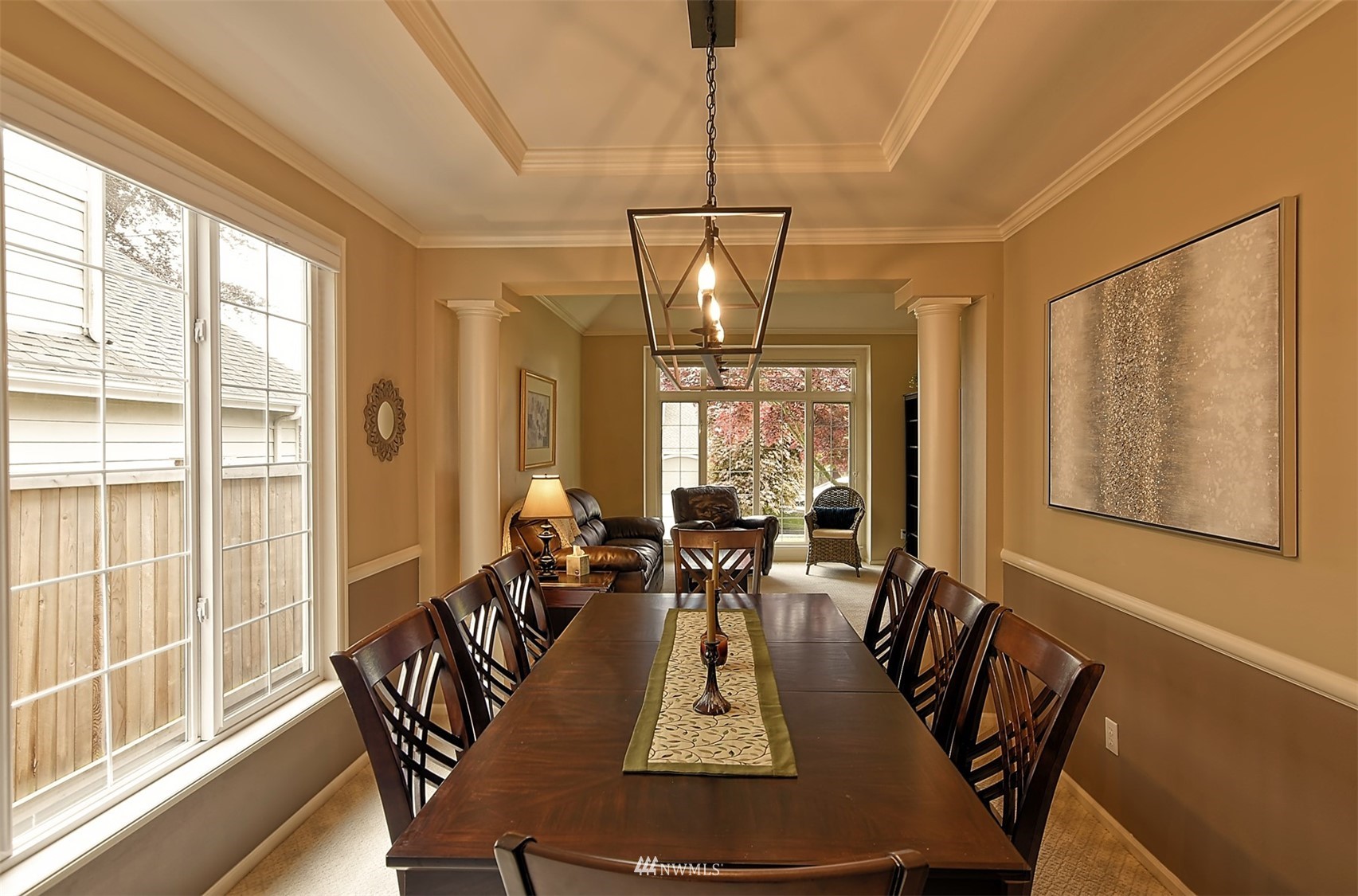 20027 29th Avenue Southeast Bothell, WA 98012 - Photo 9 of 38 a view of a dining room with furniture wooden floor and chandelier