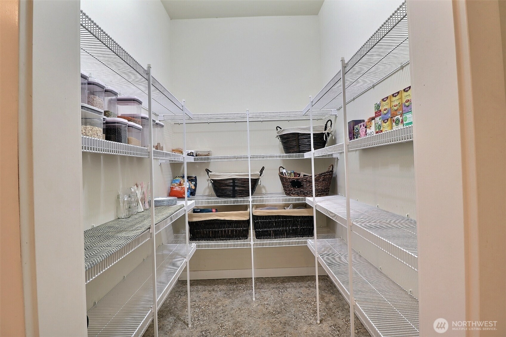 19776 Mountain Ridge Road Southeast Monroe, WA 98272 - Photo 17 of 40 a view of a room with shelves