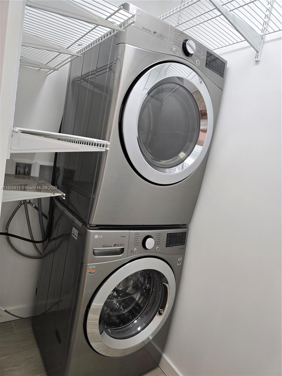 1600 Southwest 1st Avenue, Unit 809 Miami, FL 33129 - Photo 11 of 24 a utility room with dryer and washer