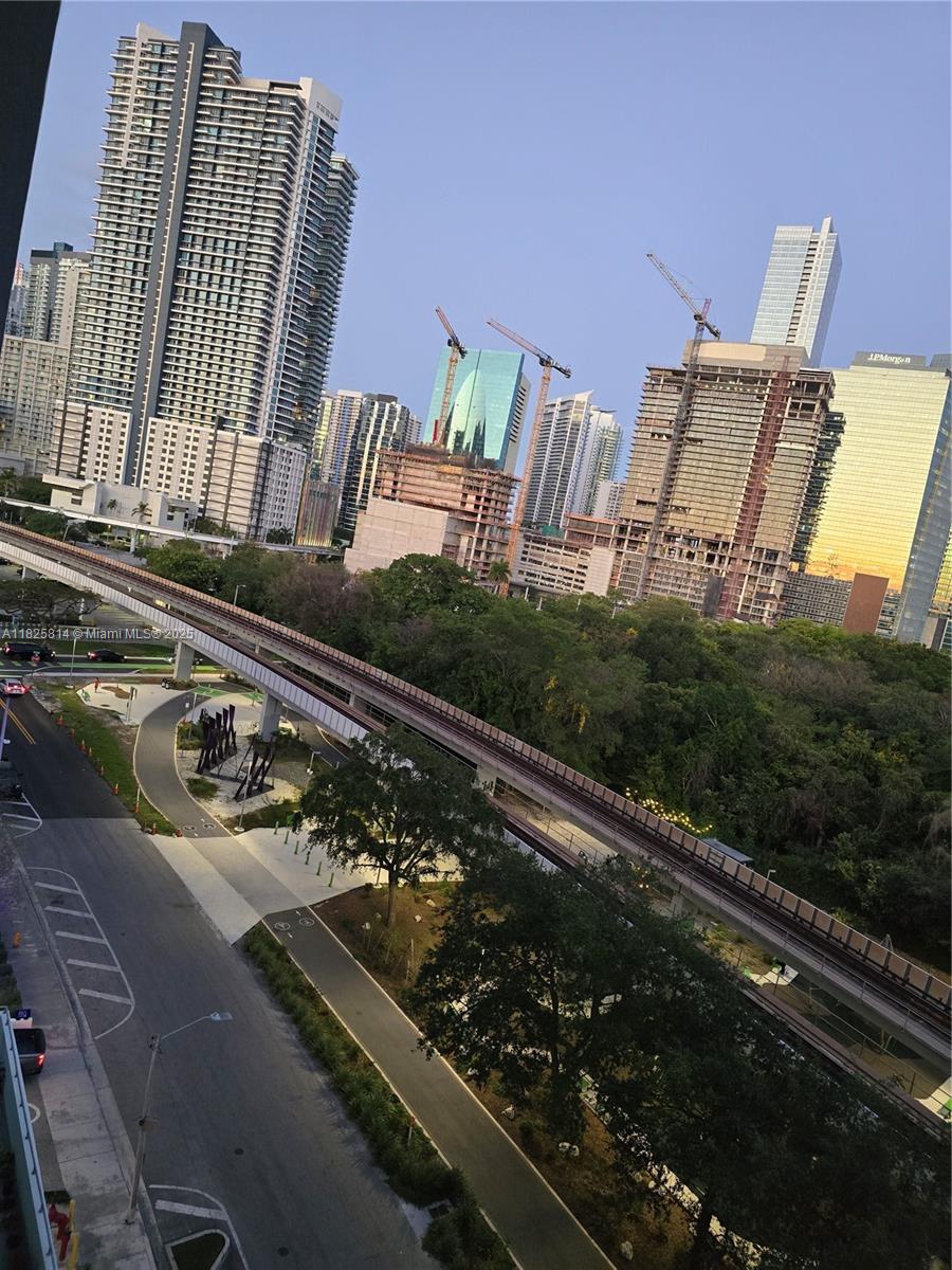 1600 Southwest 1st Avenue, Unit 809 Miami, FL 33129 - Photo 13 of 24 a view of a chairs and table in the back yard