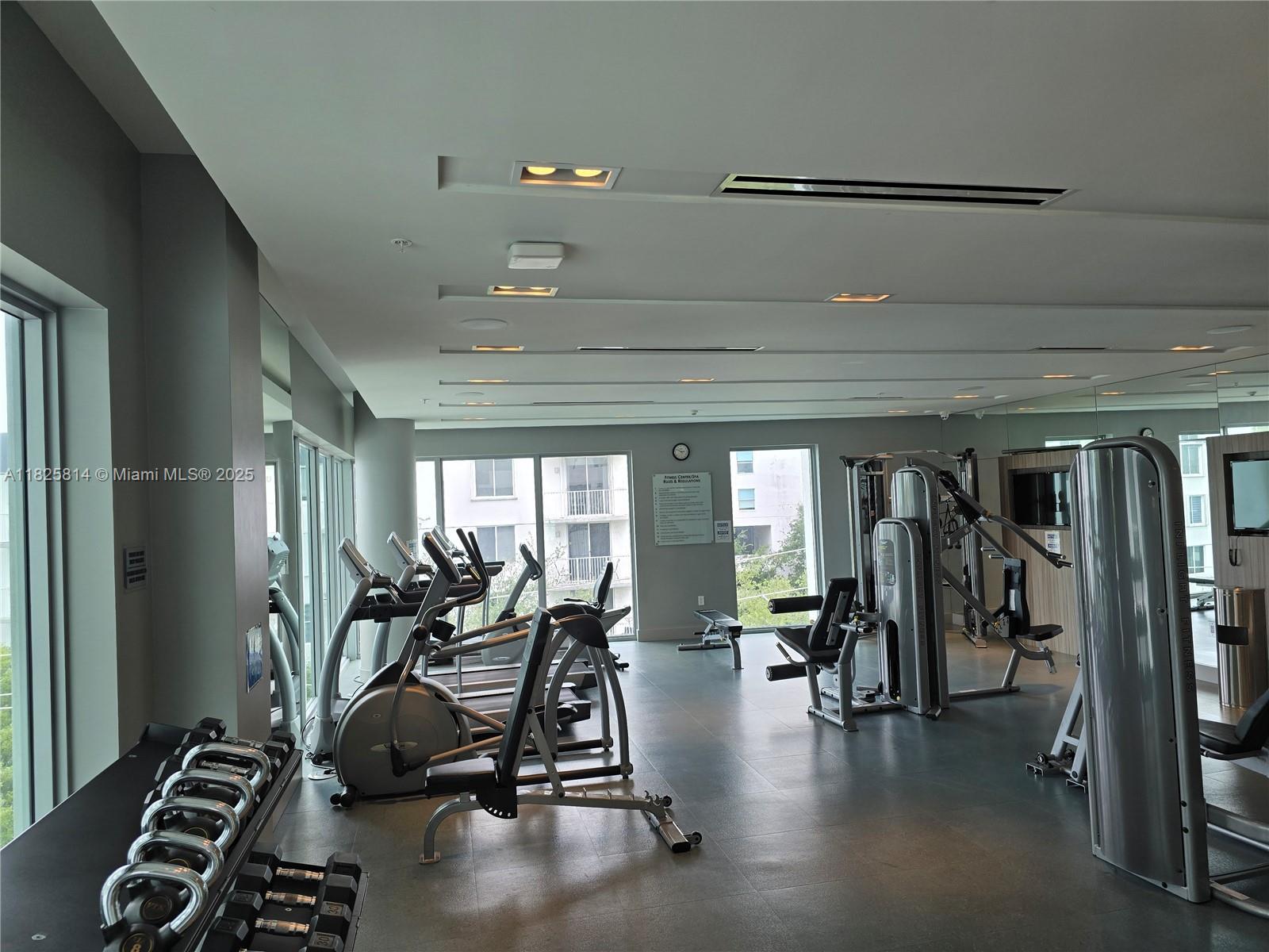 1600 Southwest 1st Avenue, Unit 809 Miami, FL 33129 - Photo 22 of 24 a view of a room with gym equipment