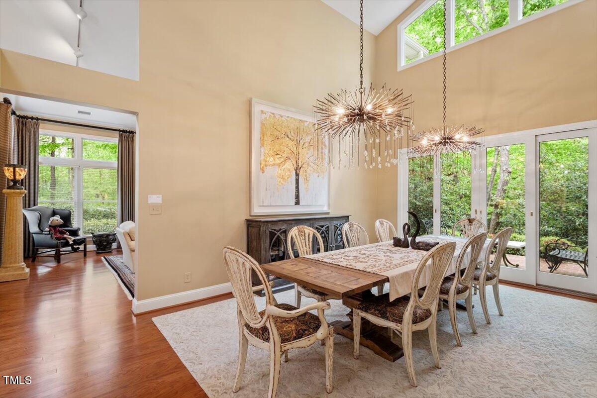 919 Woodham Pittsboro, NC 27312 - Photo 10 of 43 a view of a dining room with furniture window and wooden floor