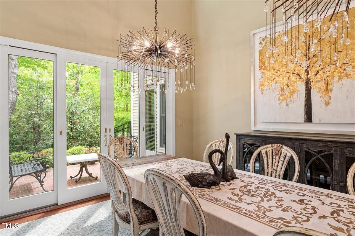 919 Woodham Pittsboro, NC 27312 - Photo 11 of 43 a view of a dining room with furniture window and outside view