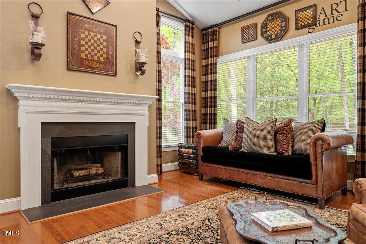 919 Woodham Pittsboro, NC 27312 - Photo 14 of 43 a living room with furniture and a fireplace