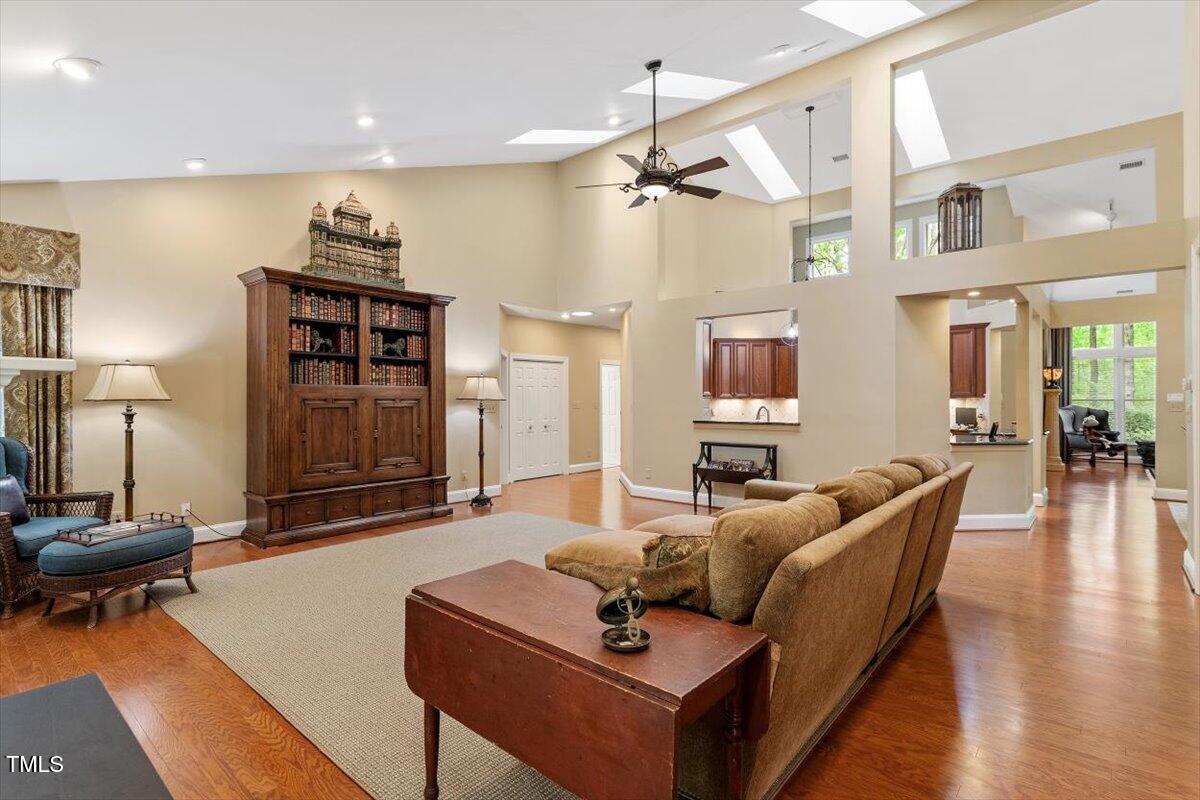 919 Woodham Pittsboro, NC 27312 - Photo 23 of 43 a living room with furniture and wooden floor