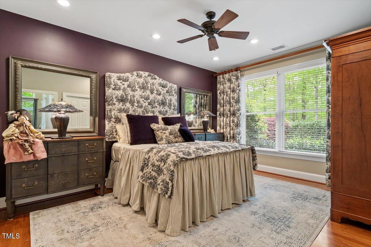 919 Woodham Pittsboro, NC 27312 - Photo 29 of 43 a bed room with a bed and a large window