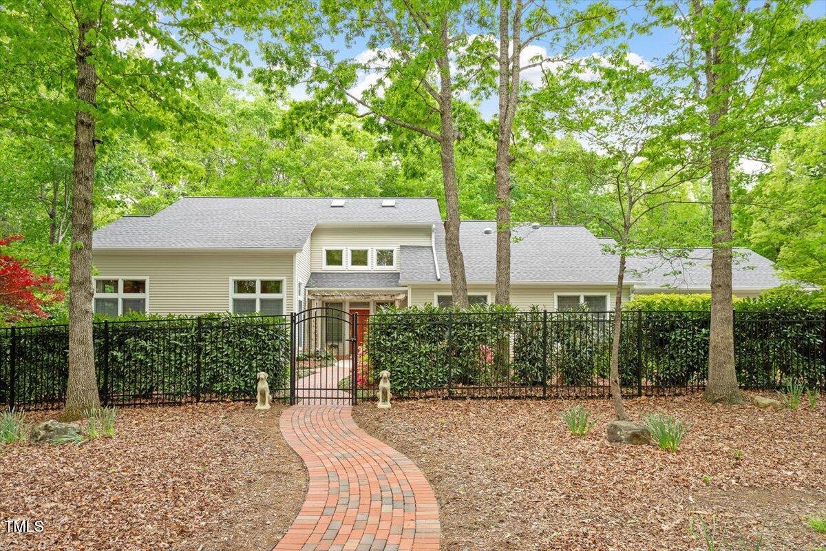919 Woodham Pittsboro, NC 27312 - Photo 2 of 43 a house view with a garden space