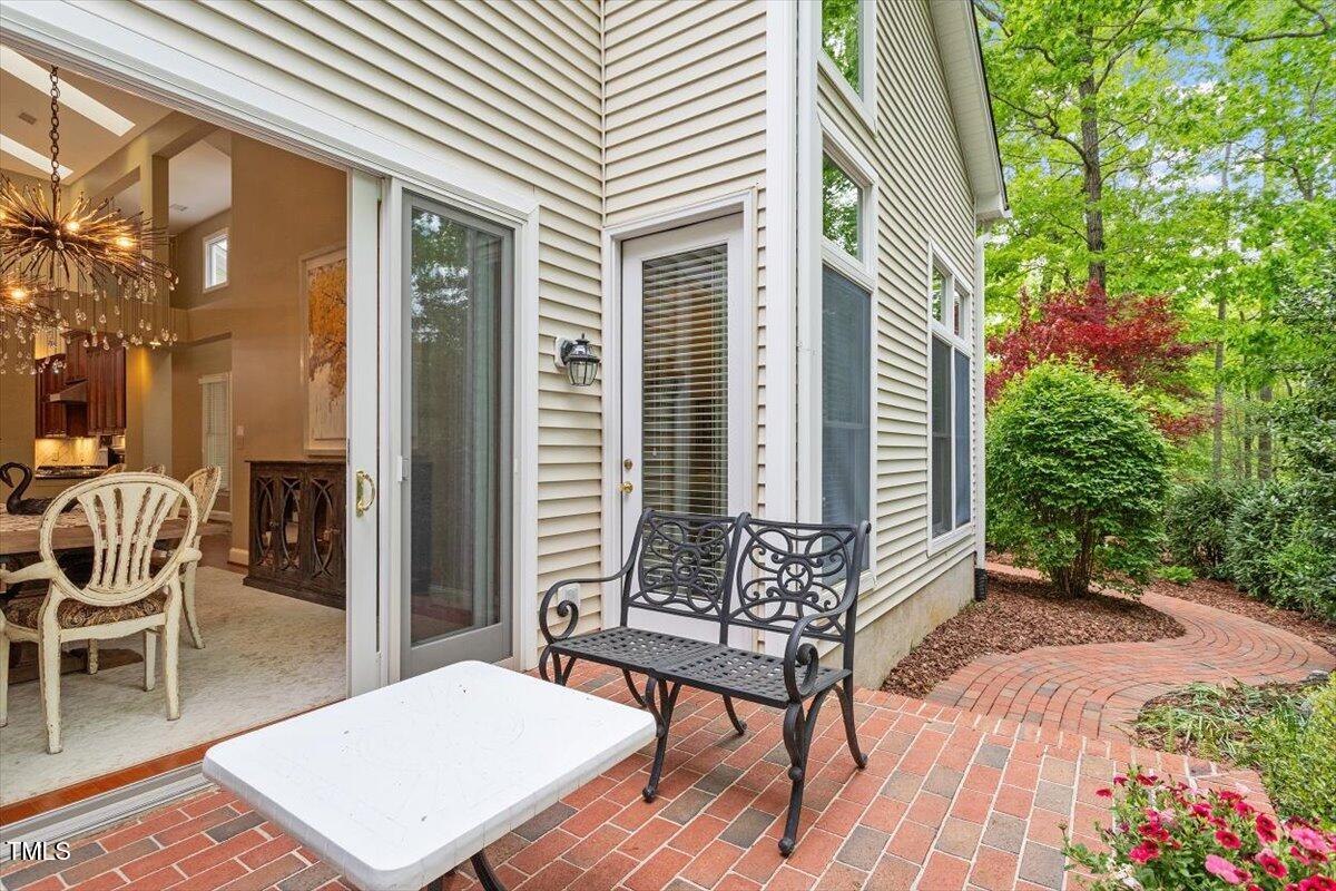 919 Woodham Pittsboro, NC 27312 - Photo 34 of 43 a backyard of a house with table and chairs