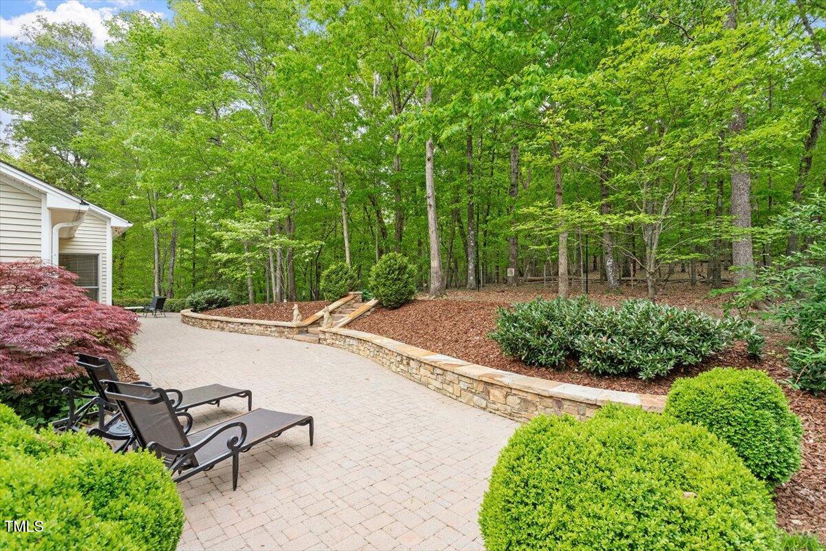 919 Woodham Pittsboro, NC 27312 - Photo 38 of 43 a view of a backyard with sitting area