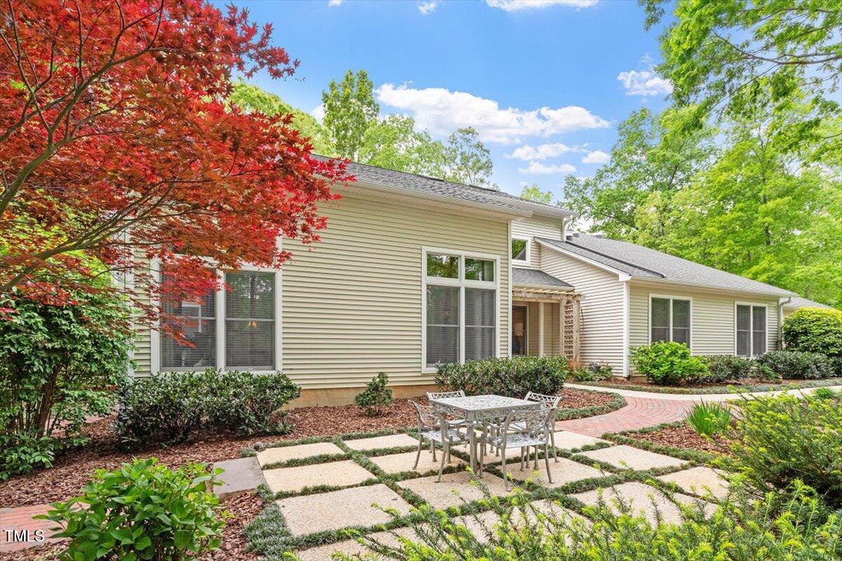919 Woodham Pittsboro, NC 27312 - Photo 4 of 43 a view of backyard with outdoor seating and green space