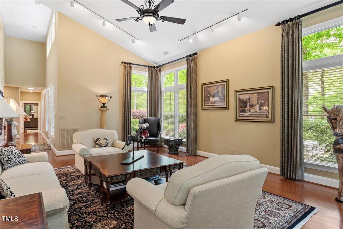919 Woodham Pittsboro, NC 27312 - Photo 8 of 43 a living room with furniture and a large window