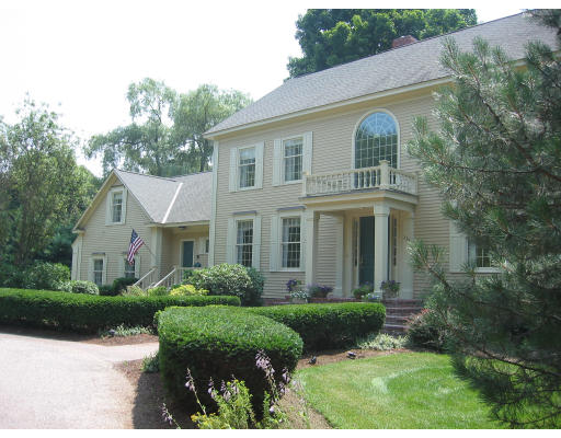 336 Lexington Road Concord, MA 01742 - Photo 1 of 10 a front view of a house with a yard and potted plants