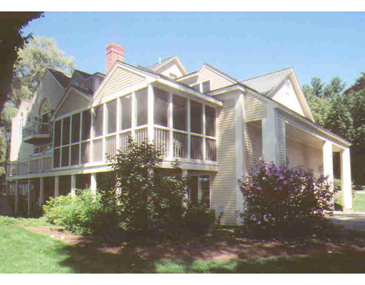 336 Lexington Road Concord, MA 01742 - Photo 3 of 10 a front view of a house with a yard