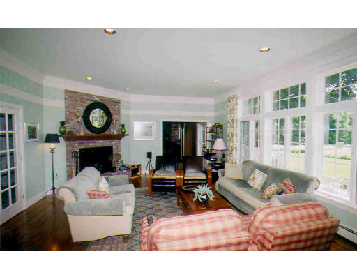 336 Lexington Road Concord, MA 01742 - Photo 6 of 10 a living room with furniture and wooden floor