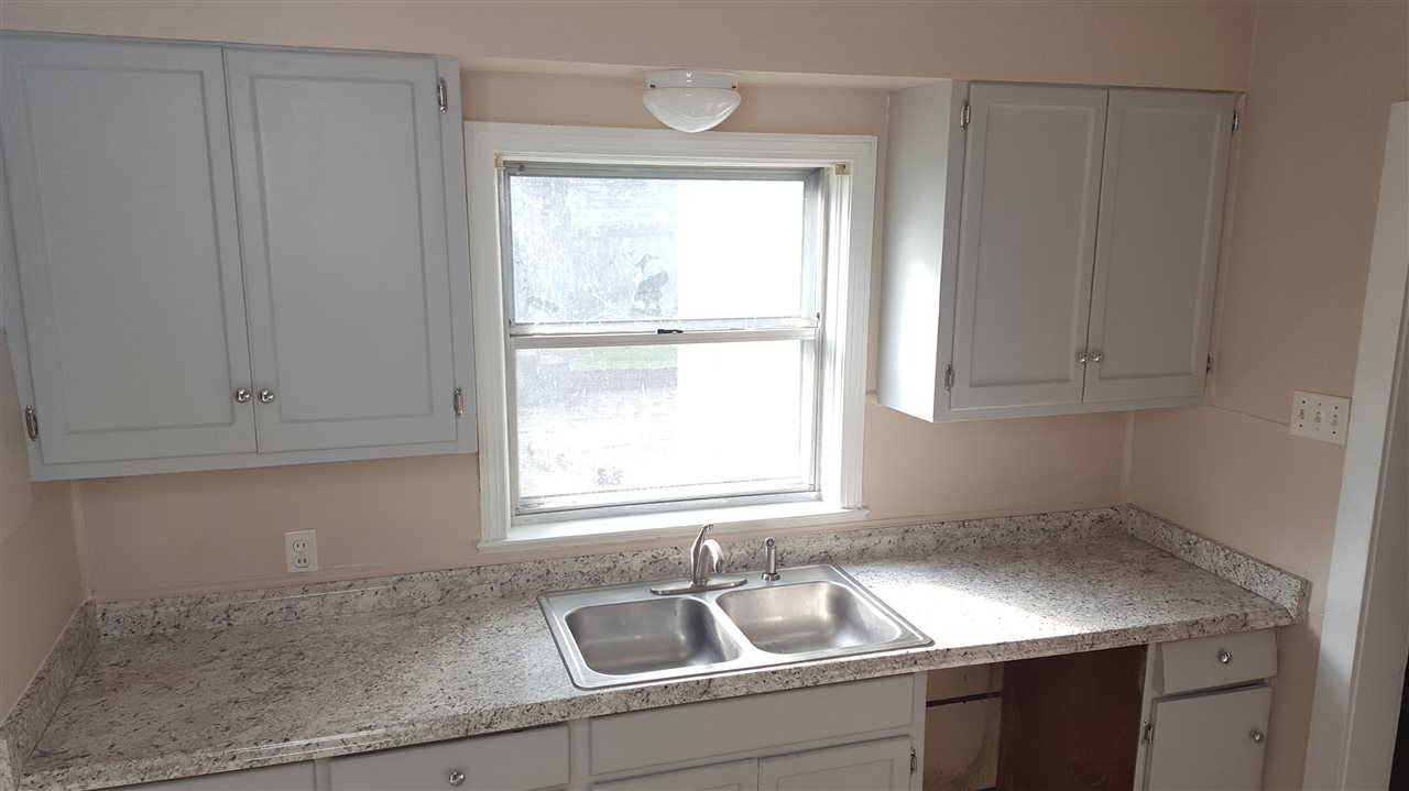 1087 Inman Road Memphis, TN 38111 - Photo 20 of 25 Refinished cabinets, new hardware, new countertops