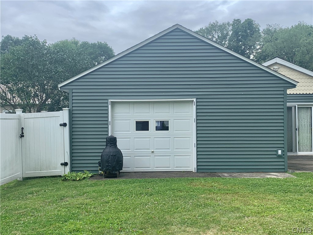 53 Pinecrest Road Whitestown, NY 13492 - Photo 32 of 33 Vinyl fence was added along with gate to side.