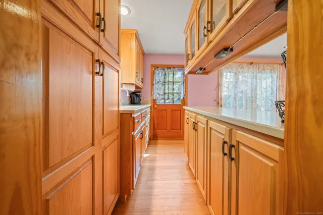 a view of a brick wall with a large windows