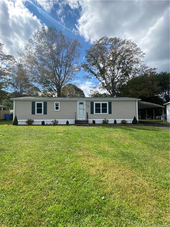 11 Skylark Road Colchester, CT 06415 - Photo 1 of 1 a front view of a house with a garden