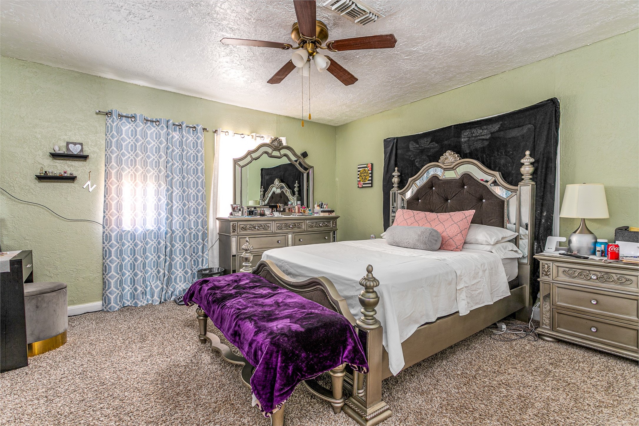 701 Ward Road Baytown, TX 77520 - Photo 12 of 19 a bedroom with a bed and a chandelier
