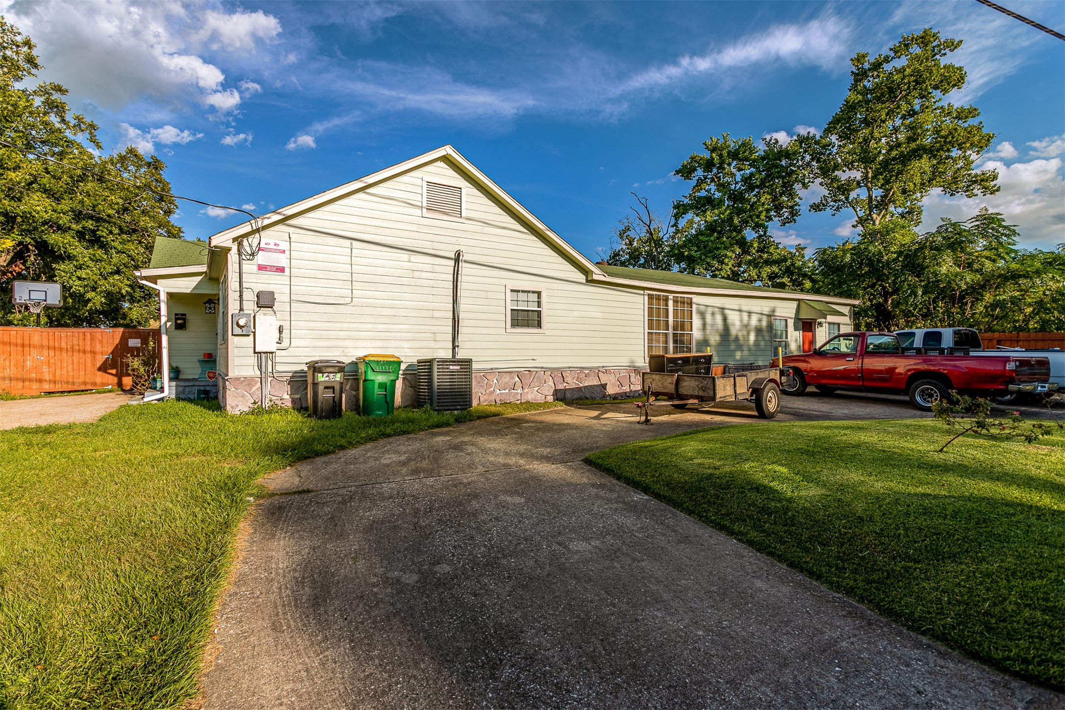 701 Ward Road Baytown, TX 77520 - Photo 16 of 19 a view of backyard of house and car parked
