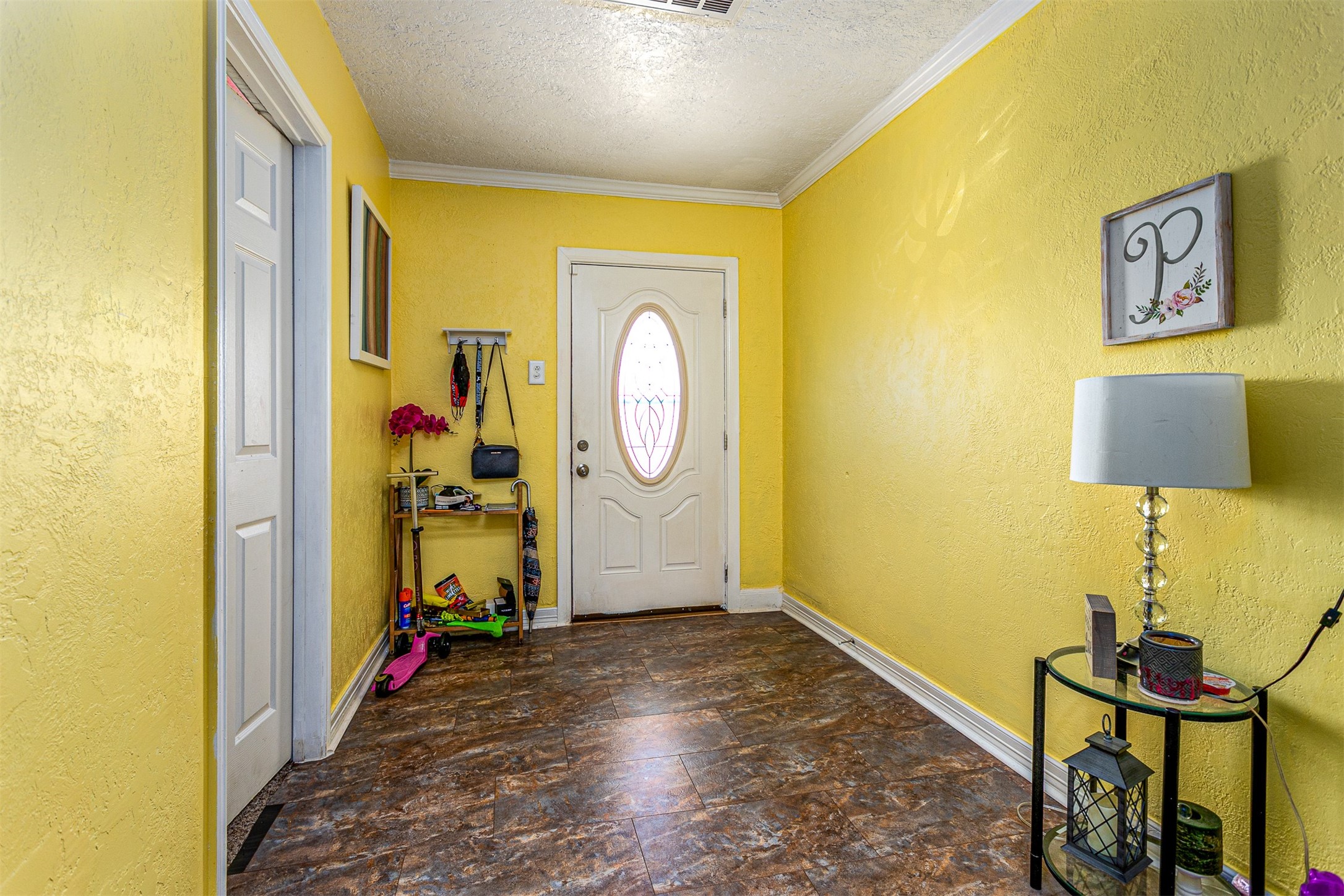 701 Ward Road Baytown, TX 77520 - Photo 3 of 19 a view of a hallway with painted walls