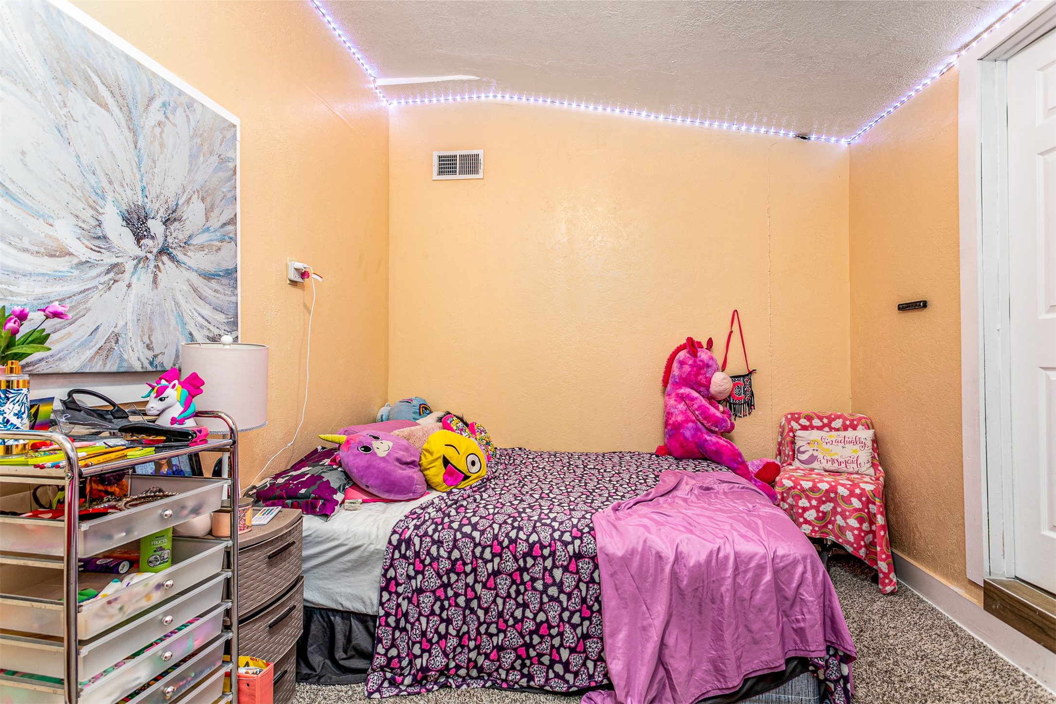 701 Ward Road Baytown, TX 77520 - Photo 7 of 19 a bedroom with a bed and a window