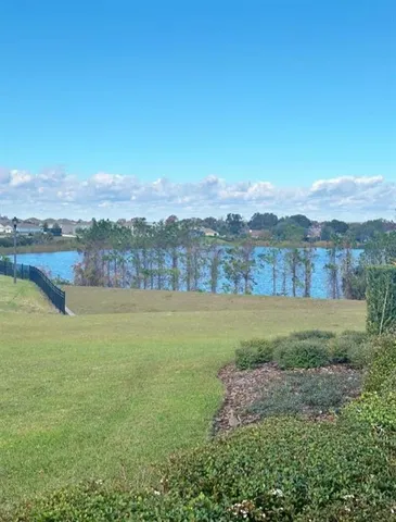 a view of a city with mountains in the background