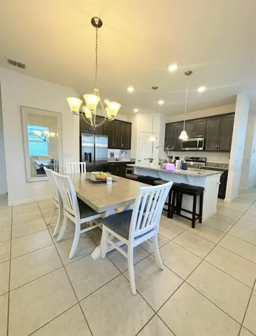 a view of a dining room and livingroom