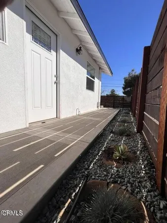 a view of a backyard of a house