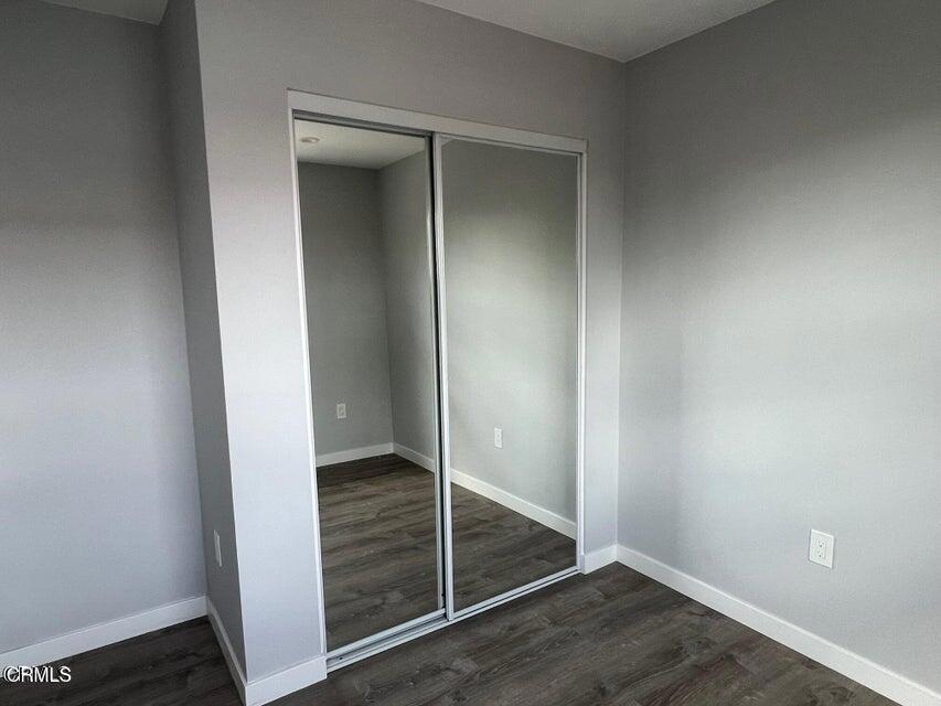 10027 Campbell Avenue Riverside, CA 92503 - Photo 7 of 9 a view of an empty room with wooden floor