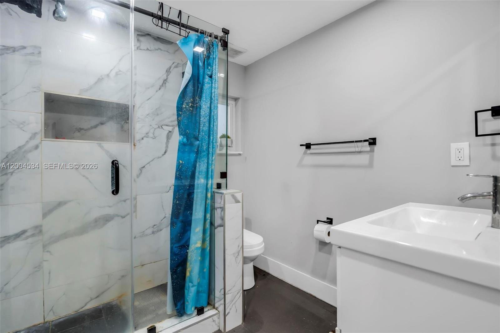 1741 Northwest 44th Street Miami, FL 33142 - Photo 20 of 45 a bathroom with a sink and toilet