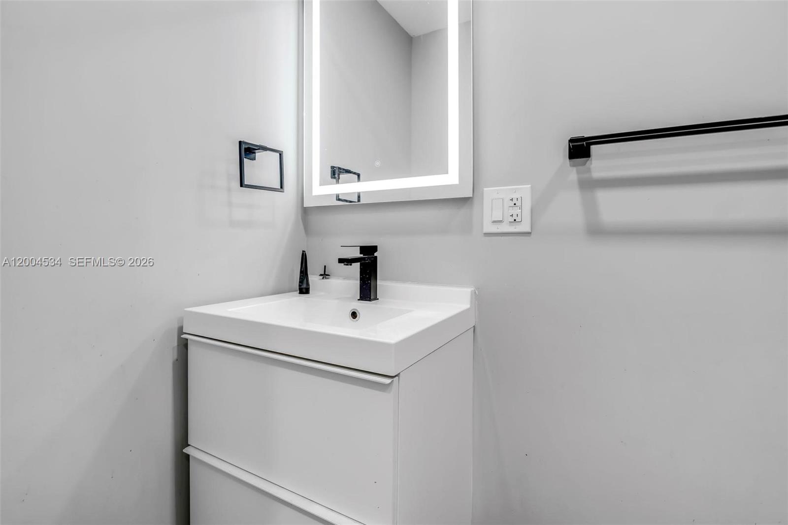 1741 Northwest 44th Street Miami, FL 33142 - Photo 23 of 45 a utility room with sink dryer and washer