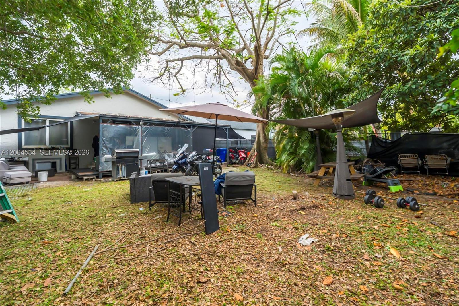 1741 Northwest 44th Street Miami, FL 33142 - Photo 32 of 45 a view of outdoor space yard and patio