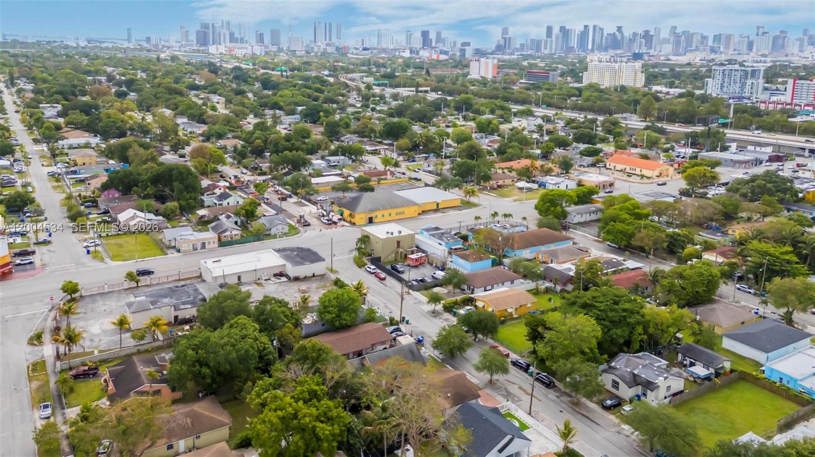 1741 Northwest 44th Street Miami, FL 33142 - Photo 42 of 45 an aerial view of residential houses with outdoor space
