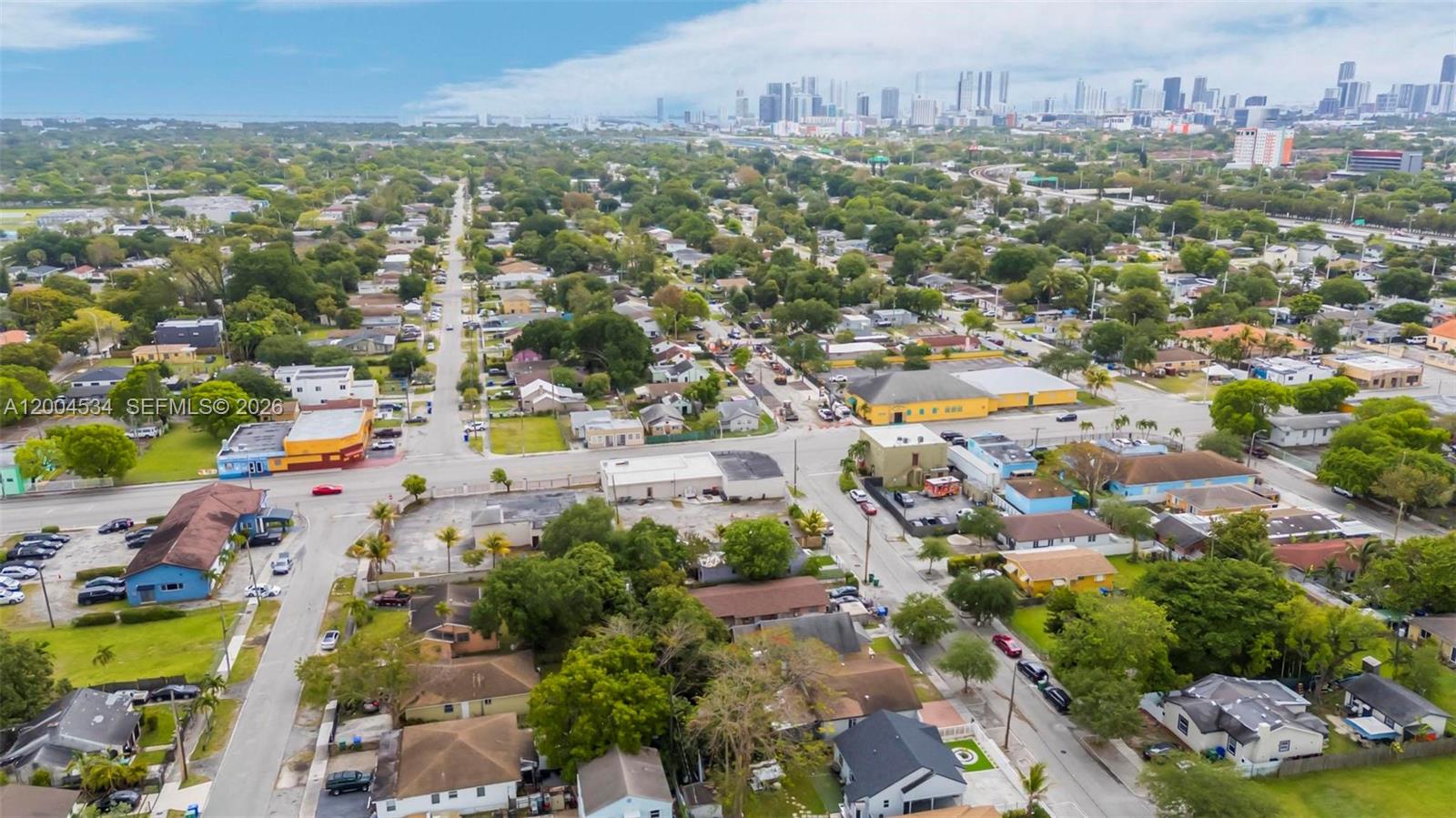 1741 Northwest 44th Street Miami, FL 33142 - Photo 43 of 45 an aerial view of a city with lots of residential buildings