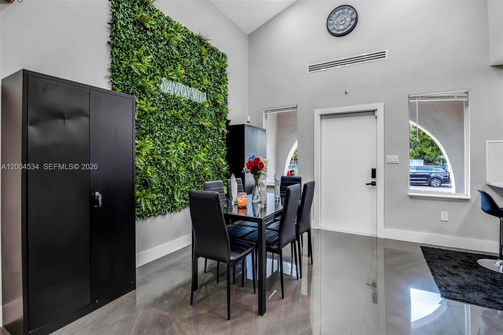 1741 Northwest 44th Street Miami, FL 33142 - Photo 9 of 45 a dining room with furniture and window