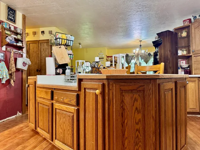 a view of a kitchen with appliances and cabinets