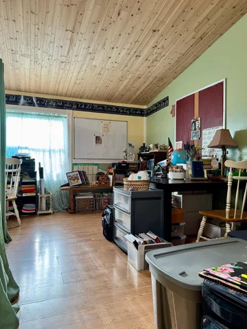 a room with lots of furniture and clutter