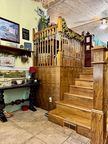 a view of entryway with a front door