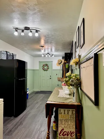 a kitchen with a sink cabinets and appliances