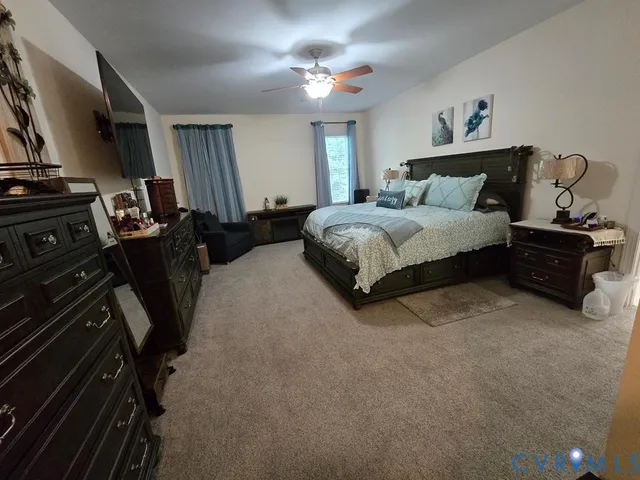 a bathroom with double sink and a mirror