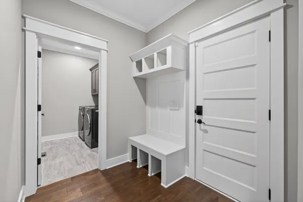 a view of entryway with wooden floor