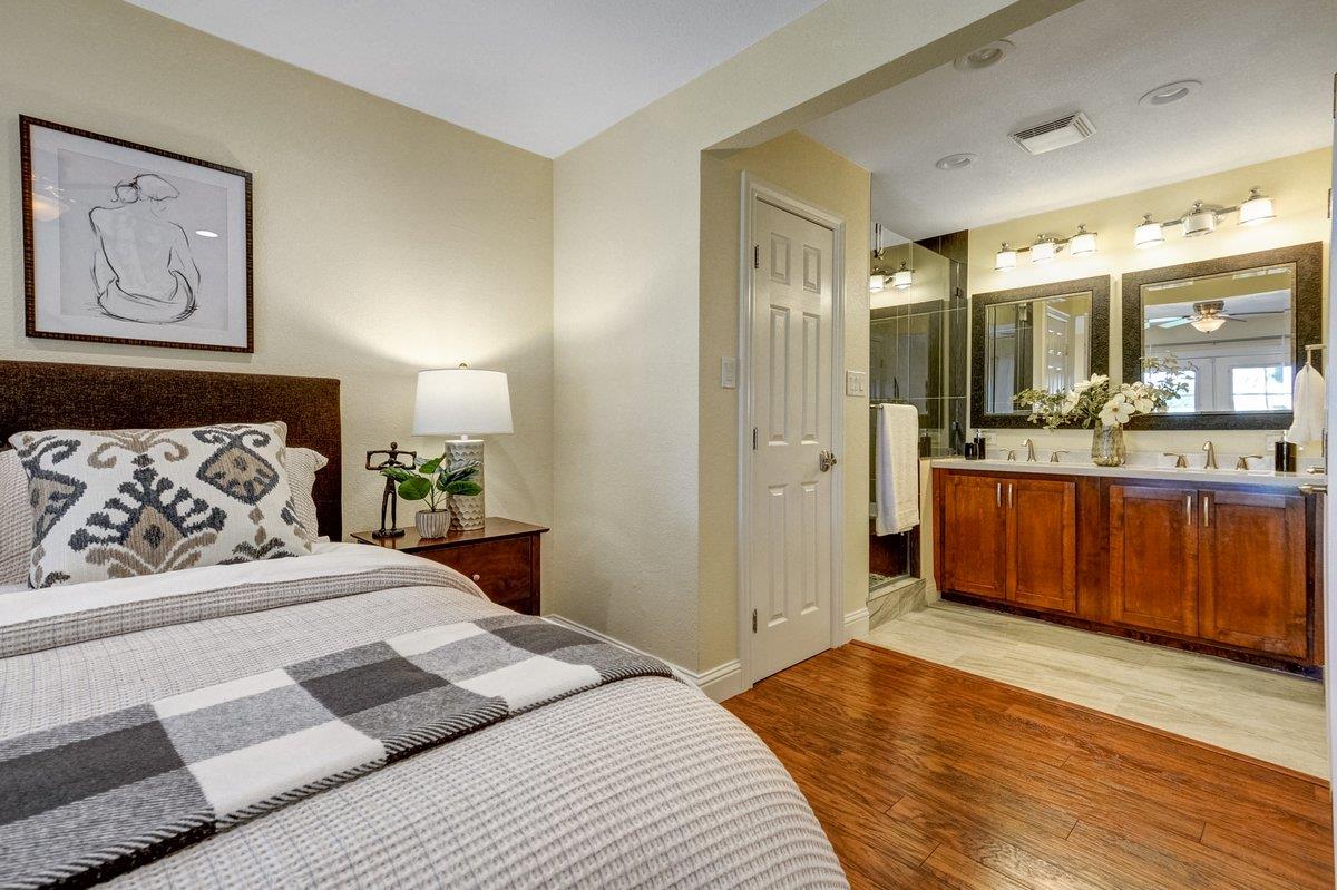 2829 Pine Valley Road San Ramon, CA 94583 - Photo 17 of 35 a bedroom with a large bed and a large mirror