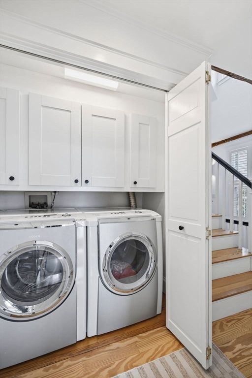 33 Franklin Street Marblehead, MA 01945 - Photo 24 of 42 a utility room with sink dryer and washer